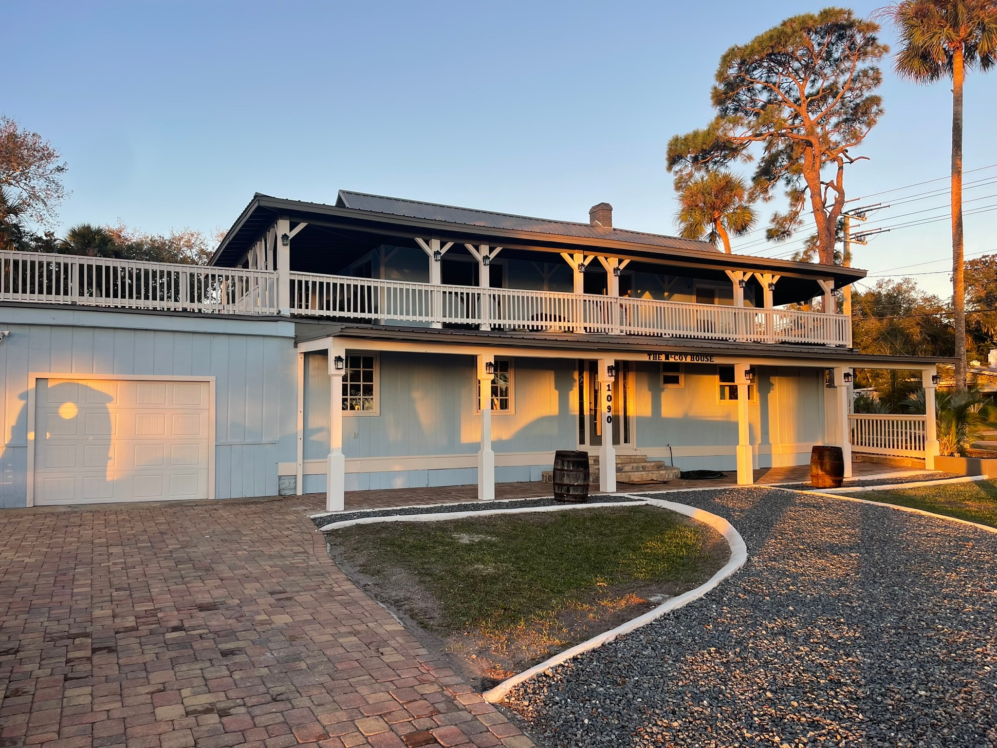 McCoy House completed renovation — finished exterior at golden hour
